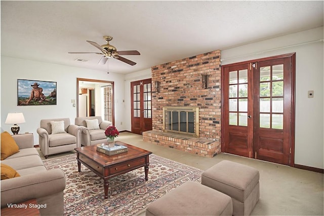 4808 Janice Ave, Kenner, LA 70065 - living area featuring french doors, carpet flooring, a fireplace, and plenty of natural light