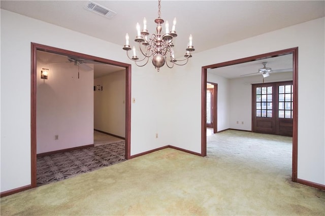 4808 Janice Ave, Kenner, LA 70065 - empty room with a ceiling fan, carpet floors, a chandelier, and french doors