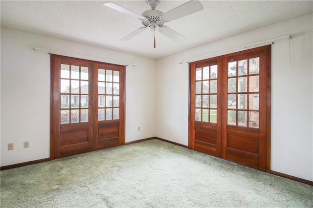 4808 Janice Ave, Kenner, LA 70065 - doorway with french doors, carpet, ceiling fan, and a textured ceiling