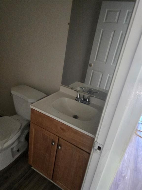 46037 Rufus Bankston Rd, Hammond, LA 70401 - bathroom with vanity and wood finished floors