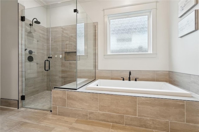 1161 Delta Ln, Covington, LA 70433 - bathroom featuring a shower stall, a bath, and crown molding