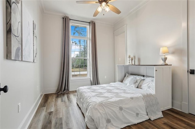 1161 Delta Ln, Covington, LA 70433 - bedroom with ornamental molding, wood finished floors, and a ceiling fan