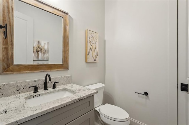 1161 Delta Ln, Covington, LA 70433 - bathroom featuring vanity and toilet