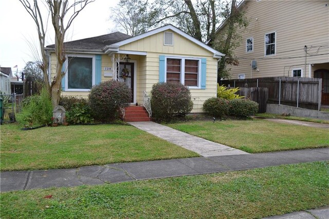 128 Gruner Rd, Metairie, LA 70001 - bungalow-style house featuring board and batten siding