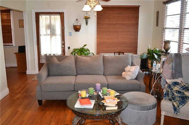 128 Gruner Rd, Metairie, LA 70001 - living room featuring ceiling fan, wood finished floors, and healthy amount of natural light