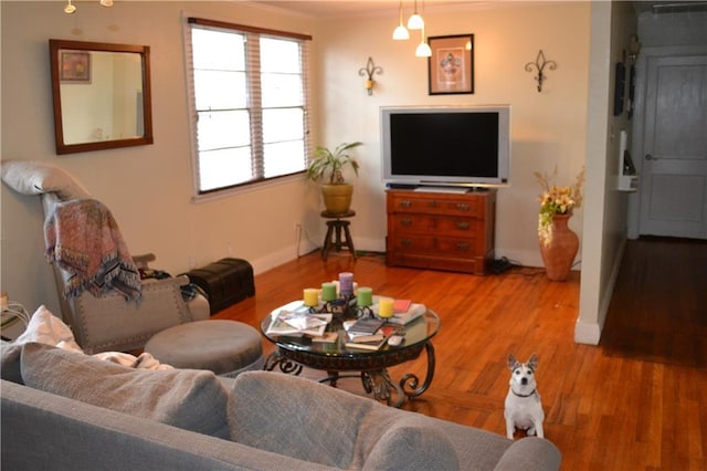 128 Gruner Rd, Metairie, LA 70001 - living room with crown molding and wood finished floors