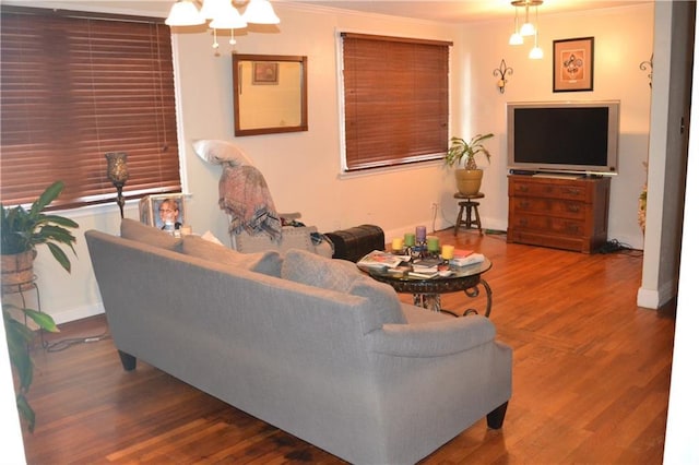 128 Gruner Rd, Metairie, LA 70001 - living area with ornamental molding and wood finished floors