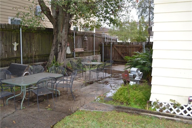 128 Gruner Rd, Metairie, LA 70001 - view of patio with outdoor dining space