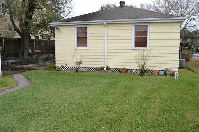 128 Gruner Rd, Metairie, LA 70001 - view of property exterior with roof with shingles and a patio