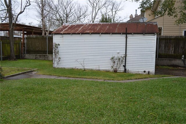 128 Gruner Rd, Metairie, LA 70001 - view of shed with a fenced backyard