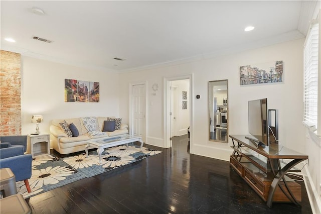 1028 Kerlerec St Unit 3, New Orleans, LA 70116 - living area with hardwood / wood-style floors, ornamental molding, and recessed lighting