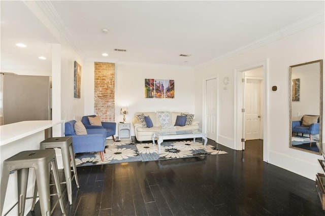 1028 Kerlerec St Unit 3, New Orleans, LA 70116 - living area featuring wood-type flooring, crown molding, and recessed lighting
