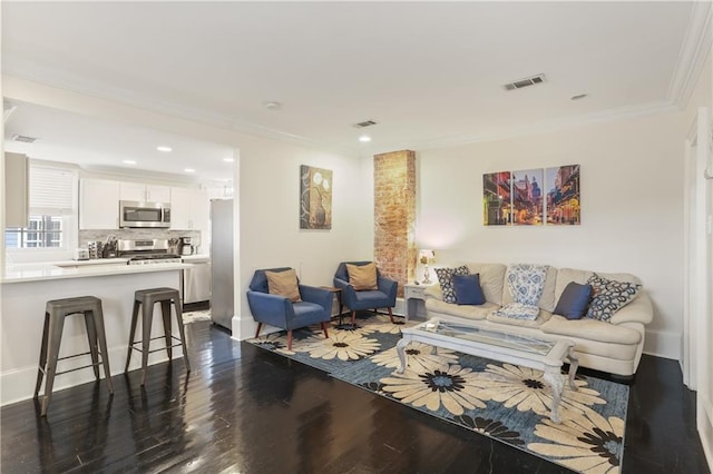 1028 Kerlerec St Unit 3, New Orleans, LA 70116 - living area featuring dark wood-style floors, crown molding, and recessed lighting