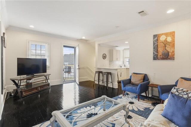 1028 Kerlerec St Unit 3, New Orleans, LA 70116 - living area with recessed lighting, crown molding, and dark wood-style flooring