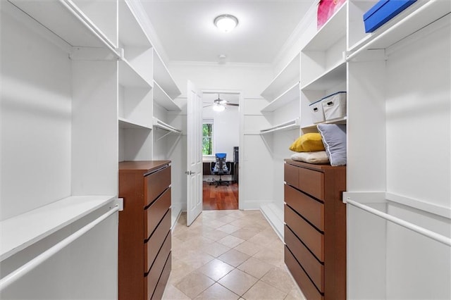 10 Finch St, New Orleans, LA 70124 - spacious closet with ceiling fan and light tile patterned floors