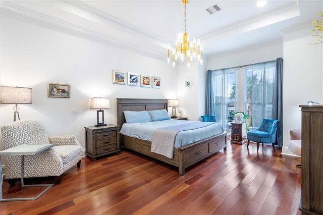 10 Finch St, New Orleans, LA 70124 - bedroom featuring a raised ceiling, wood finished floors, a chandelier, and ornamental molding