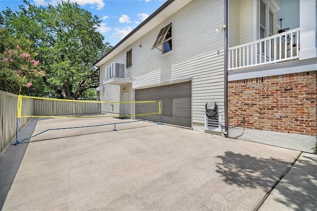 10 Finch St, New Orleans, LA 70124 - patio / terrace with a garage and concrete driveway