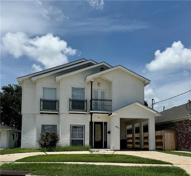 4925 Jasper St, Metairie, LA 70006 - view of front of property with a balcony and brick siding