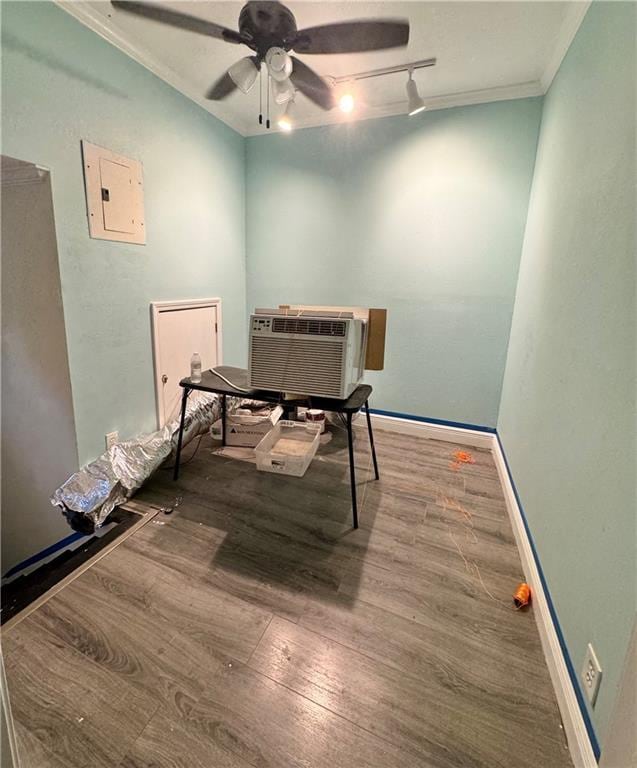 4925 Jasper St, Metairie, LA 70006 - office area featuring electric panel, wood finished floors, a ceiling fan, crown molding, and an AC wall unit