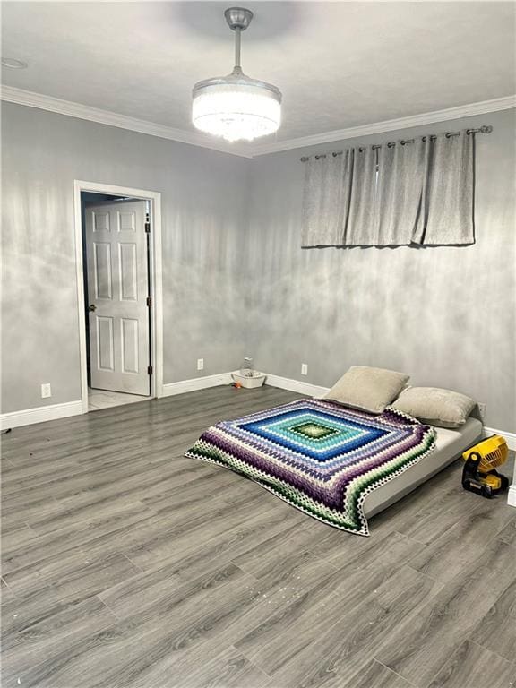4925 Jasper St, Metairie, LA 70006 - bedroom featuring wood finished floors and crown molding