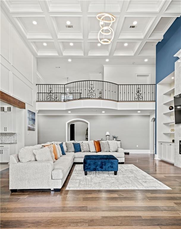 31350 Walker Rd, Walker, LA 70785 - living area featuring recessed lighting, coffered ceiling, a towering ceiling, wood finished floors, and a chandelier