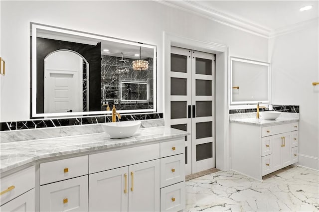 31350 Walker Rd, Walker, LA 70785 - bathroom with ornamental molding, two vanities, marble finish flooring, a marble finish shower, and recessed lighting
