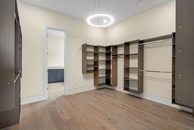 3028 Sunrise Blvd, Slidell, LA 70461 - unfurnished bedroom with light wood-type flooring and connected bathroom