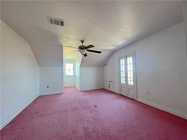 30 Clinton Dr, New Orleans, LA 70129 - bonus room featuring vaulted ceiling, ceiling fan, and carpet