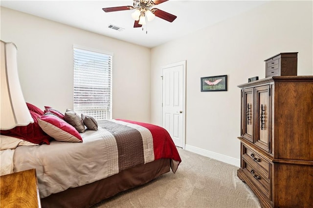 356 Aspen Ln, Covington, LA 70433 - bedroom with light colored carpet and ceiling fan