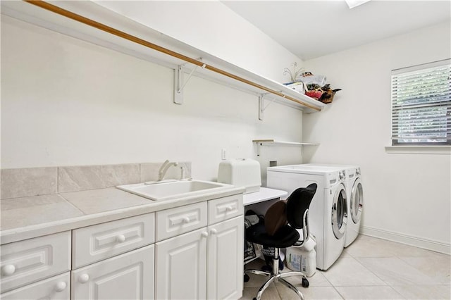 356 Aspen Ln, Covington, LA 70433 - laundry room with washer and dryer, light tile patterned flooring, cabinet space, and a desk