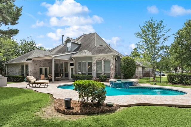356 Aspen Ln, Covington, LA 70433 - rear view of property featuring french doors, a patio, brick siding, and a pool with connected hot tub