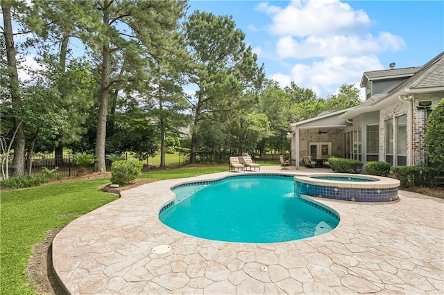 356 Aspen Ln, Covington, LA 70433 - view of pool featuring a patio, a ceiling fan, a pool with connected hot tub, view of wooded area, and french doors