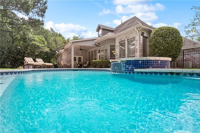 356 Aspen Ln, Covington, LA 70433 - swimming pool with ceiling fan, a patio, and french doors