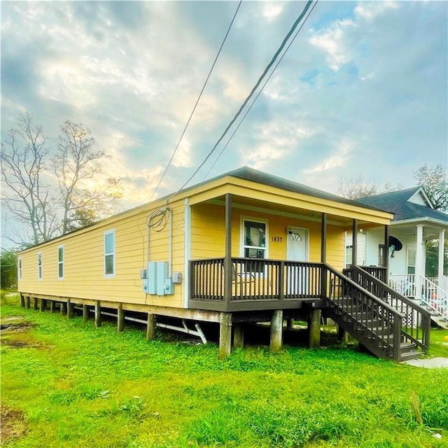 1837 Charbonnet St, New Orleans, LA 70117 - back of house featuring a porch