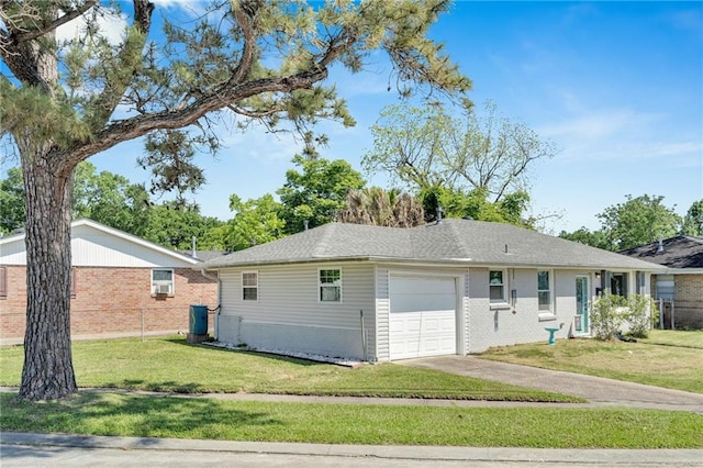 301 Rural St, River Ridge, LA 70123 - view of property exterior with an attached garage, brick siding, and a lawn