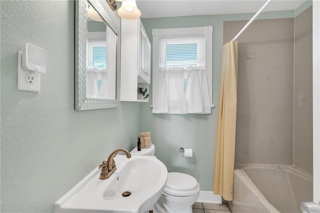 301 Rural St, River Ridge, LA 70123 - bathroom with tile patterned floors and shower / bathtub combination with curtain