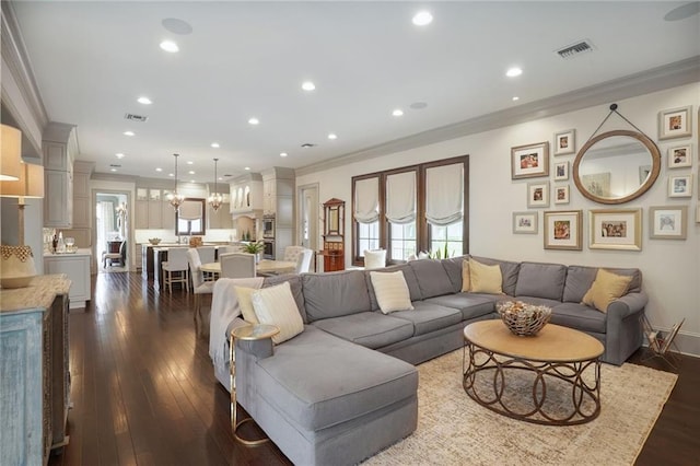 21 Royal Palm Dr, Kenner, LA 70065 - living area featuring crown molding, dark wood-style floors, and recessed lighting
