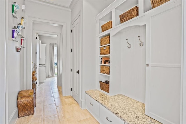 21 Royal Palm Dr, Kenner, LA 70065 - mudroom featuring crown molding and baseboards