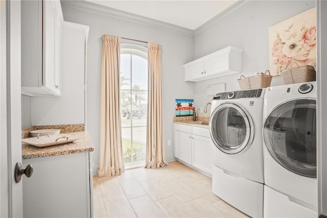 21 Royal Palm Dr, Kenner, LA 70065 - washroom with separate washer and dryer, cabinet space, crown molding, and plenty of natural light