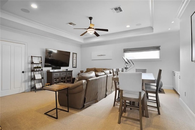 21 Royal Palm Dr, Kenner, LA 70065 - living room with a raised ceiling, light colored carpet, a ceiling fan, ornamental molding, and recessed lighting