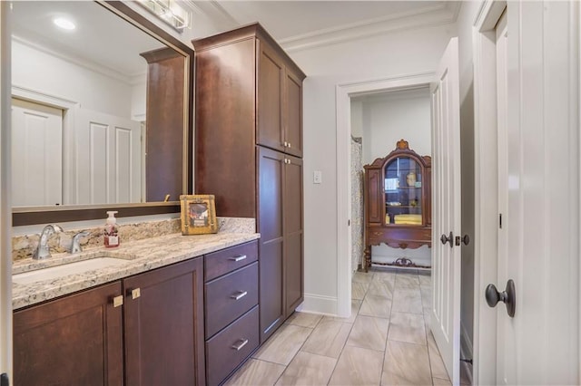 21 Royal Palm Dr, Kenner, LA 70065 - bathroom with ornamental molding, vanity, and marble finish flooring