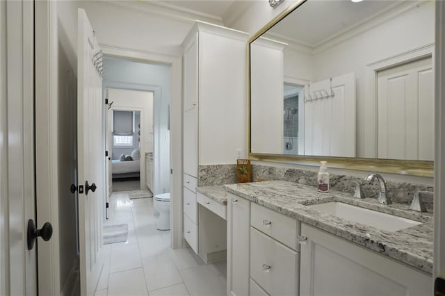 21 Royal Palm Dr, Kenner, LA 70065 - bathroom featuring ornamental molding, vanity, ensuite bathroom, and tile patterned floors
