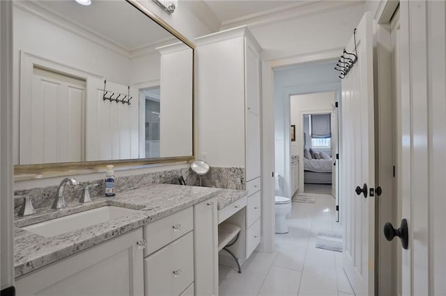 21 Royal Palm Dr, Kenner, LA 70065 - ensuite bathroom with vanity, tile patterned floors, and crown molding