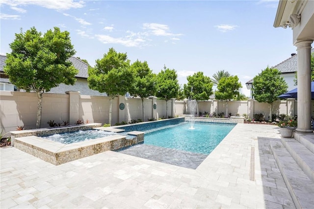 21 Royal Palm Dr, Kenner, LA 70065 - view of swimming pool with a patio area, a pool with connected hot tub, and a fenced backyard