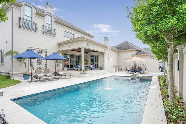 21 Royal Palm Dr, Kenner, LA 70065 - view of pool featuring a patio area, a pool with connected hot tub, and a ceiling fan