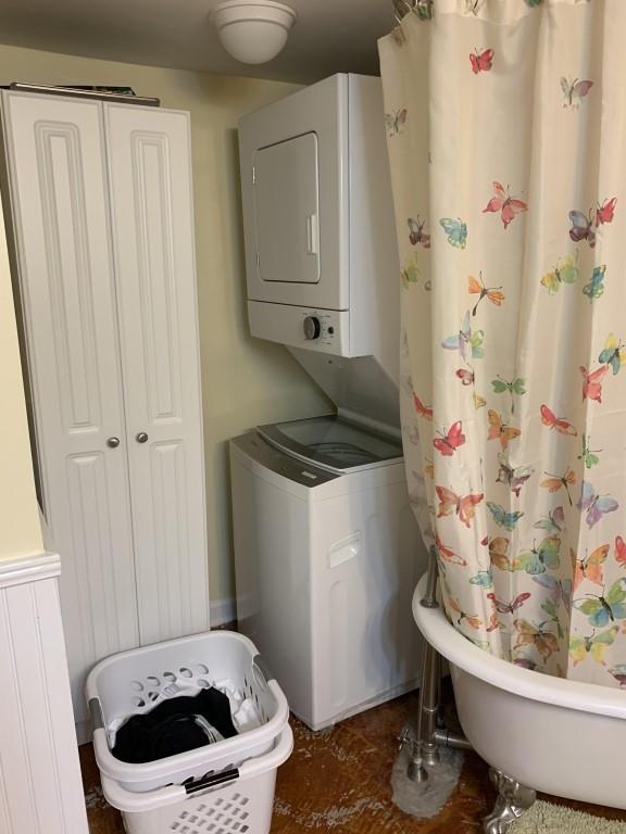2527 Calhoun St, New Orleans, LA 70118 - laundry room with stacked washer and clothes dryer