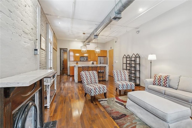 1140 Decatur St Unit 3, New Orleans, LA 70116 - living area with dark wood-style flooring