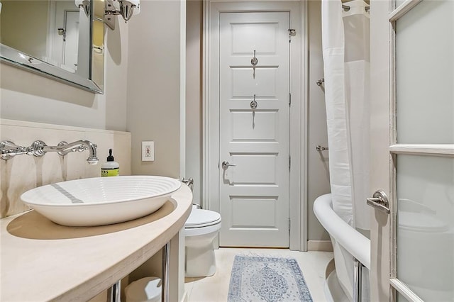 1140 Decatur St Unit 3, New Orleans, LA 70116 - bathroom with a shower with shower curtain and vanity