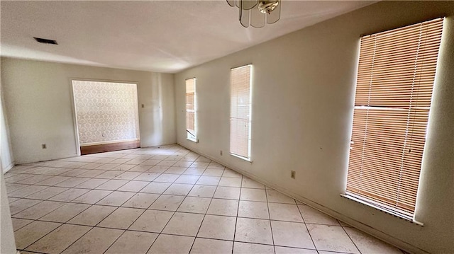 5761 Carlisle Ct, New Orleans, LA 70131 - empty room with light tile patterned floors