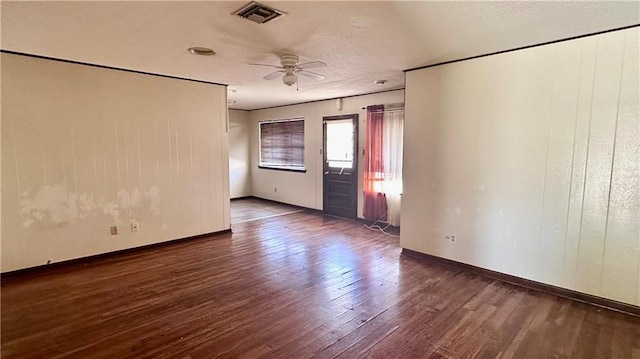 5761 Carlisle Ct, New Orleans, LA 70131 - spare room featuring wood finished floors, a ceiling fan, and a textured ceiling